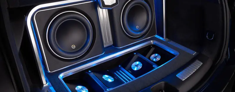 Custom JL Audio subwoofer and amplifier build with blue accent lighting